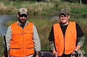 Current Conflict Veteran Teaching a Kid How to Shoot