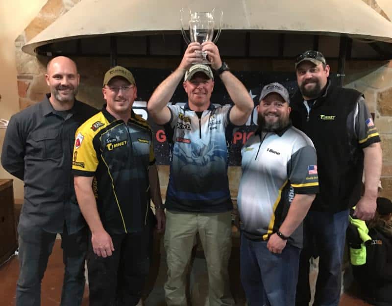 Greg Jordan hoists the Timney Cup